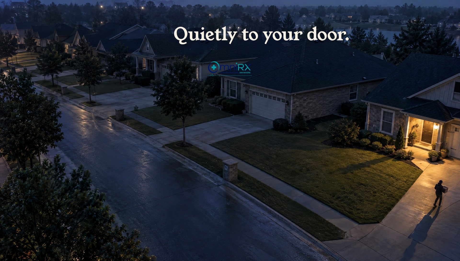A dawn street from above, one porch lit
